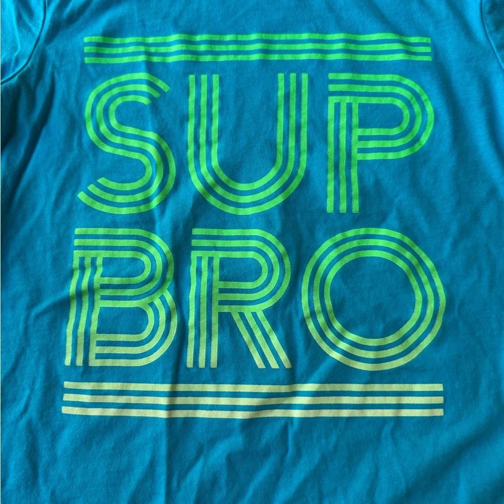 OshKosh B'gosh Teal T-Shirt With “SUP BRO” In Green Lettering